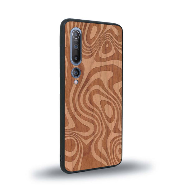 Coque de protection en bois véritable fabriquée en France pour Xiaomi Mi 10 avec un motif abstrait représentant les mouvements de l'eau