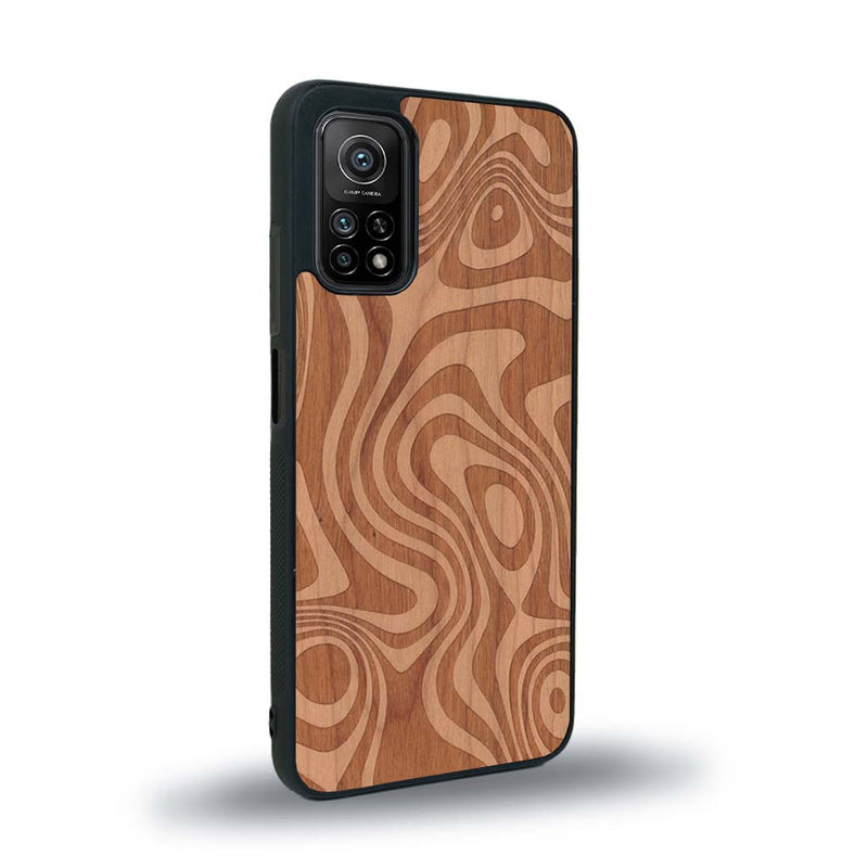 Coque de protection en bois véritable fabriquée en France pour Xiaomi Mi 10 Lite avec un motif abstrait représentant les mouvements de l'eau