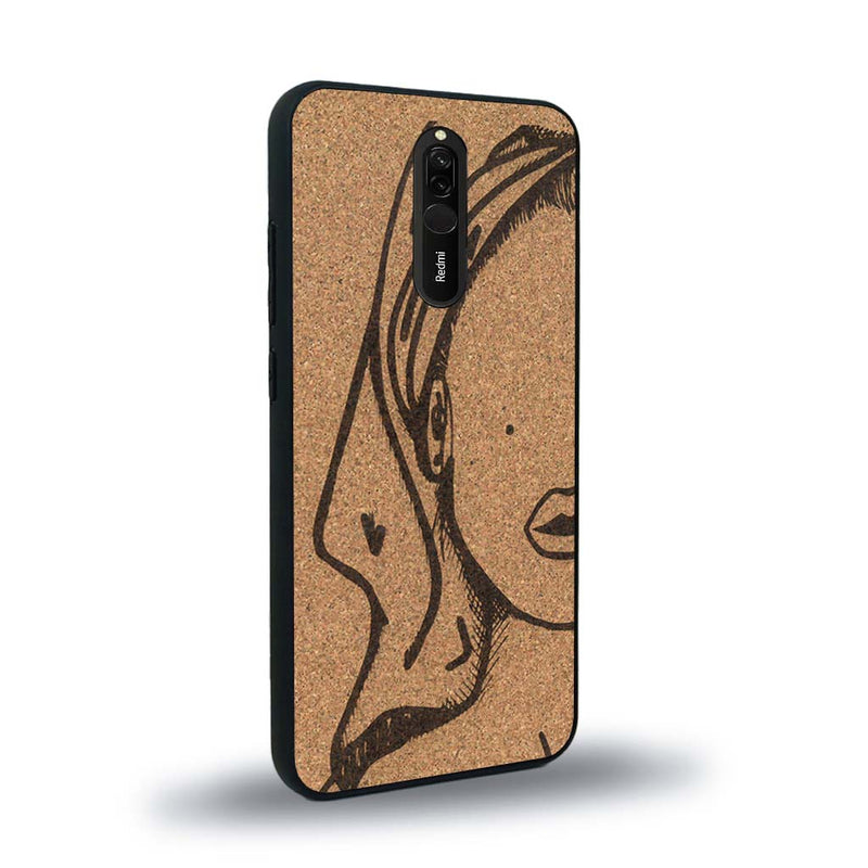 Coque de protection en bois véritable fabriquée en France pour Xiaomi Mi 9T représentant une silhouette féminine épurée de type line art en collaboration avec l'artiste Maud Dabs