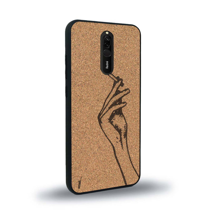 Coque de protection en bois véritable fabriquée en France pour Xiaomi Mi 9T représentant une main de femme tenant une cigarette de type line art en collaboration avec l'artiste Maud Dabs
