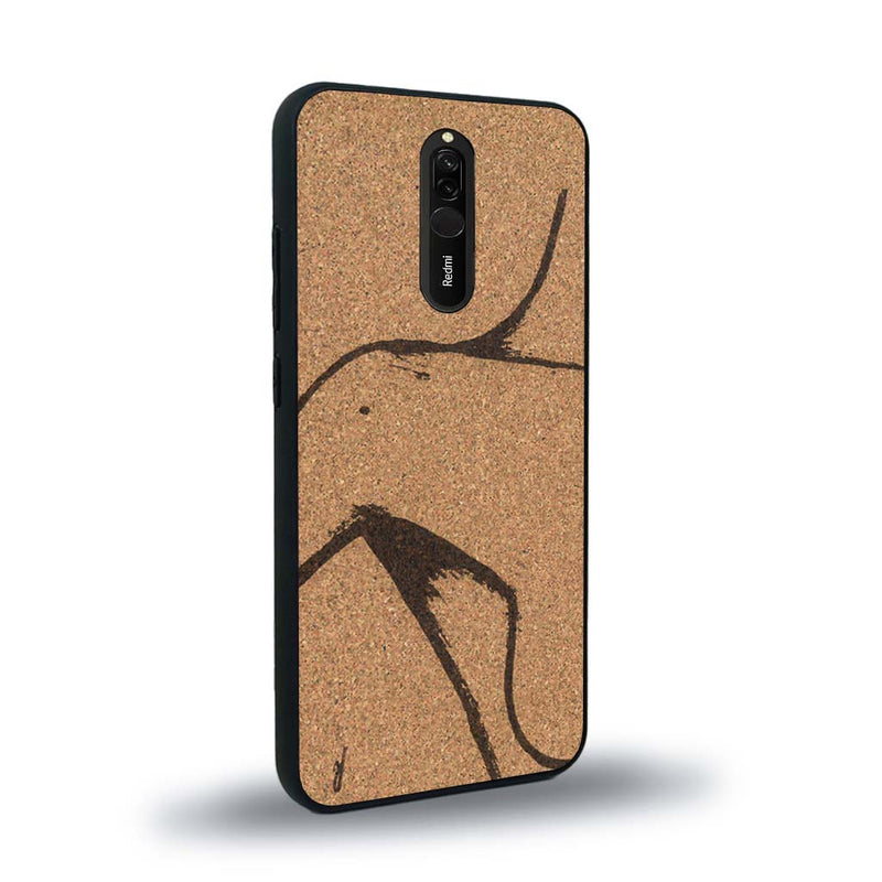 Coque de protection en bois véritable fabriquée en France pour Xiaomi Mi 9T représentant une silhouette féminine dessinée à la main par l'artiste Maud Dabs