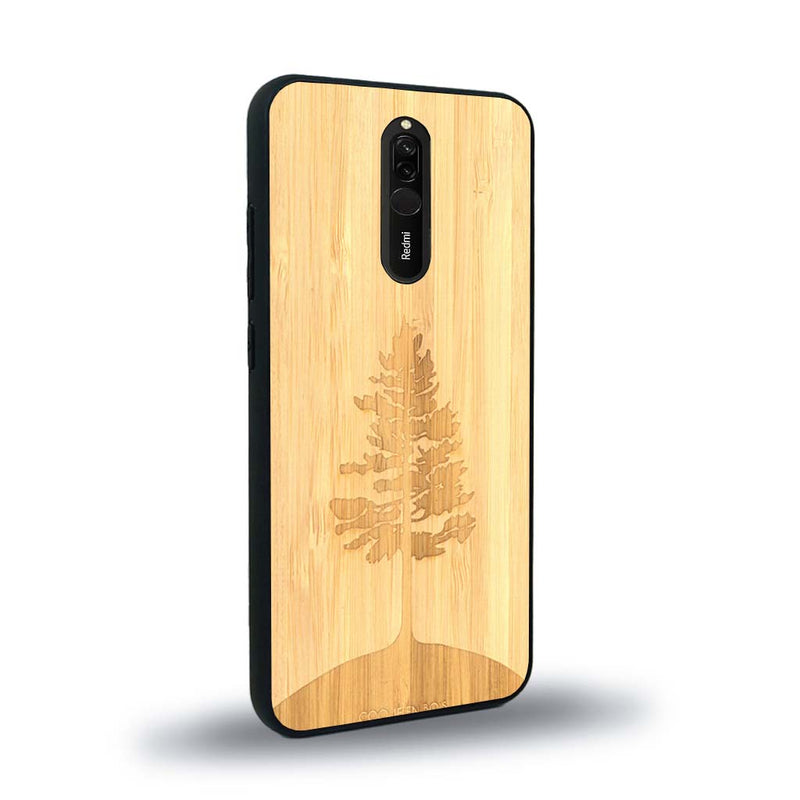 Coque de protection en bois véritable fabriquée en France pour Xiaomi Mi 9T sur le thème de la nature, de la fôret et de l'écoresponsabilité avec une gravure représentant un arbre 