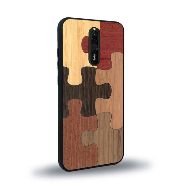 Coque de protection en bois véritable fabriquée en France pour Xiaomi Mi 9T représentant un puzzle en six pièces qui allie du chêne fumé, du noyer, du bambou, du padouk, du merisier et de l'acajou