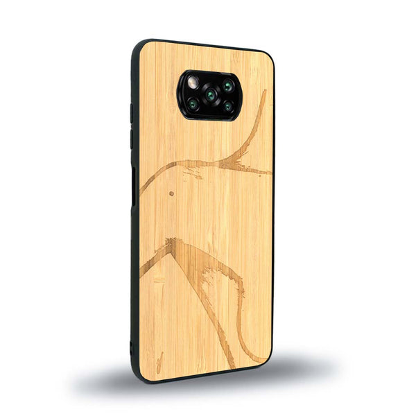 Coque de protection en bois véritable fabriquée en France pour Xiaomi Poco X3 Nfc représentant une silhouette féminine dessinée à la main par l'artiste Maud Dabs