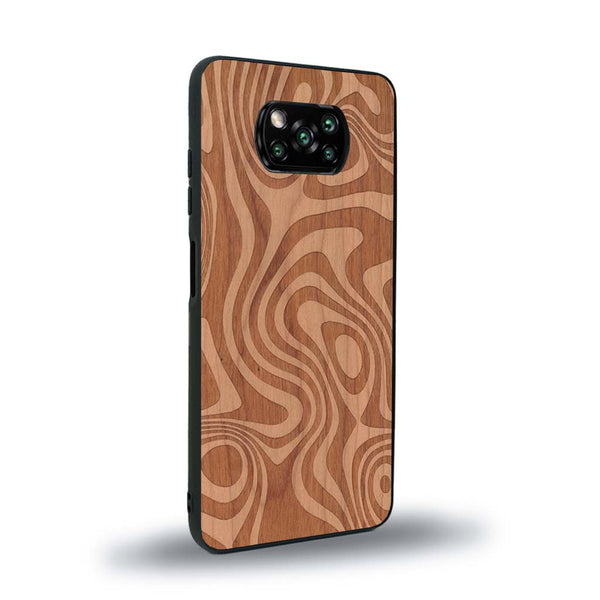 Coque de protection en bois véritable fabriquée en France pour Xiaomi Poco X3 Nfc avec un motif abstrait représentant les mouvements de l'eau