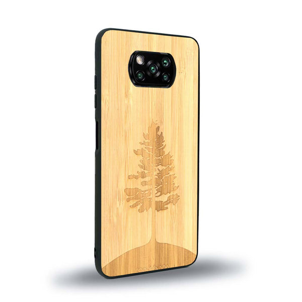 Coque de protection en bois véritable fabriquée en France pour Xiaomi Poco X3 Nfc sur le thème de la nature, de la fôret et de l'écoresponsabilité avec une gravure représentant un arbre 