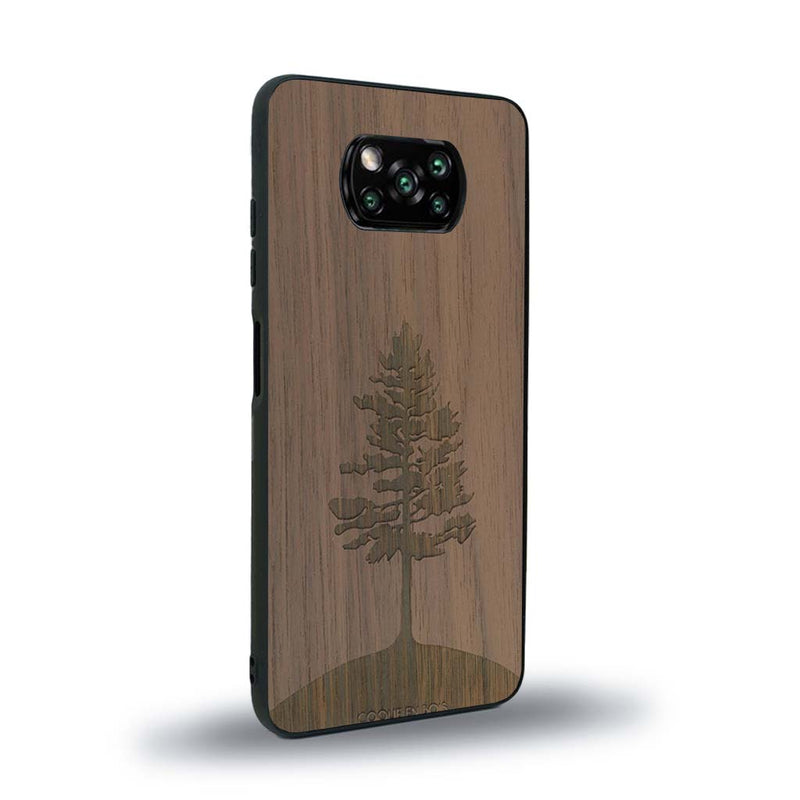 Coque de protection en bois véritable fabriquée en France pour Xiaomi Poco X3 Nfc sur le thème de la nature, de la fôret et de l'écoresponsabilité avec une gravure représentant un arbre 