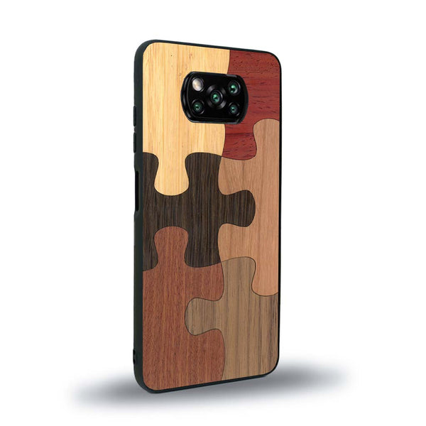 Coque de protection en bois véritable fabriquée en France pour Xiaomi Poco X3 Nfc représentant un puzzle en six pièces qui allie du chêne fumé, du noyer, du bambou, du padouk, du merisier et de l'acajou