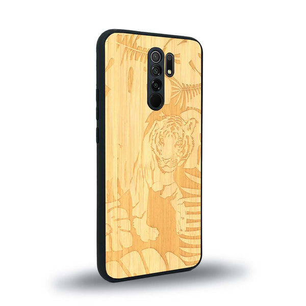 Coque de protection en bois véritable fabriquée en France pour Xiaomi Redmi 9 sur le thème de la nature et des animaux représentant un tigre dans la jungle entre des fougères