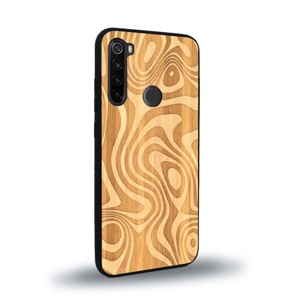 Coque de protection en bois véritable fabriquée en France pour Xiaomi Redmi Note 8 avec un motif abstrait représentant les mouvements de l'eau