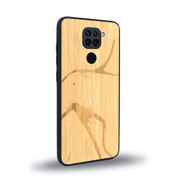 Coque de protection en bois véritable fabriquée en France pour Xiaomi Redmi Note 9 représentant une silhouette féminine dessinée à la main par l'artiste Maud Dabs